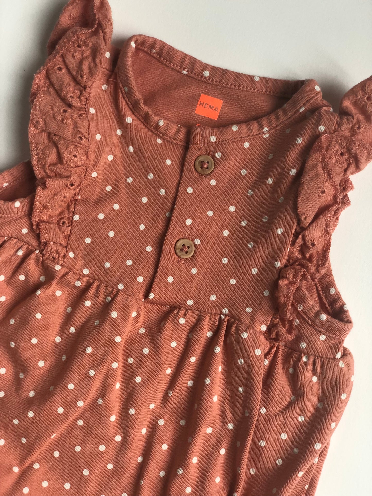 Barboteuse rose à pois blanc Hema 3 mois