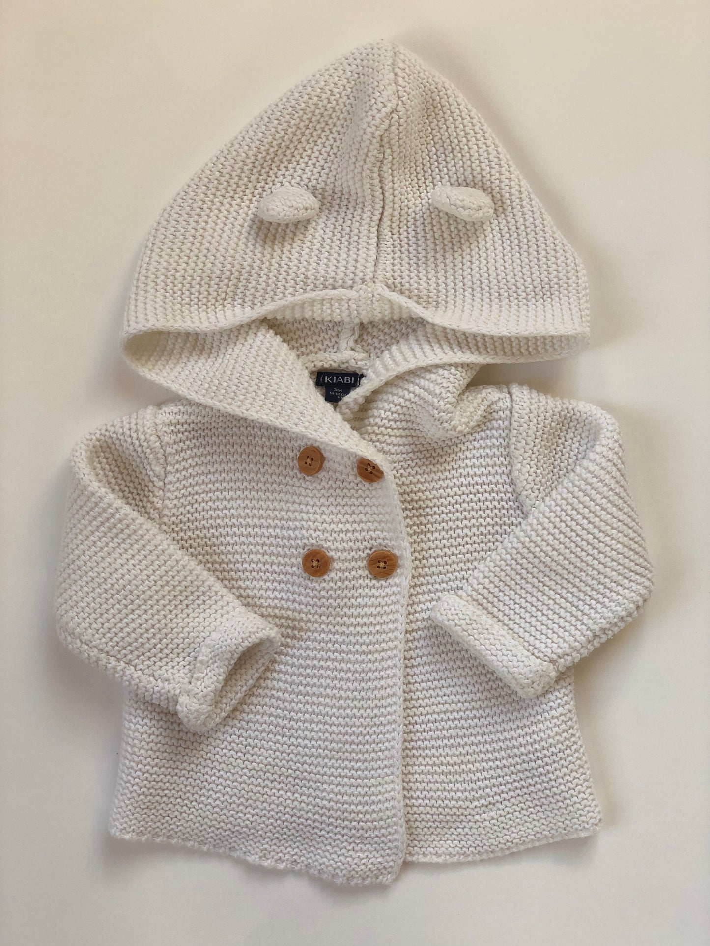 Gilet à capuche en mailles blanc et crème Kiabi 3 mois