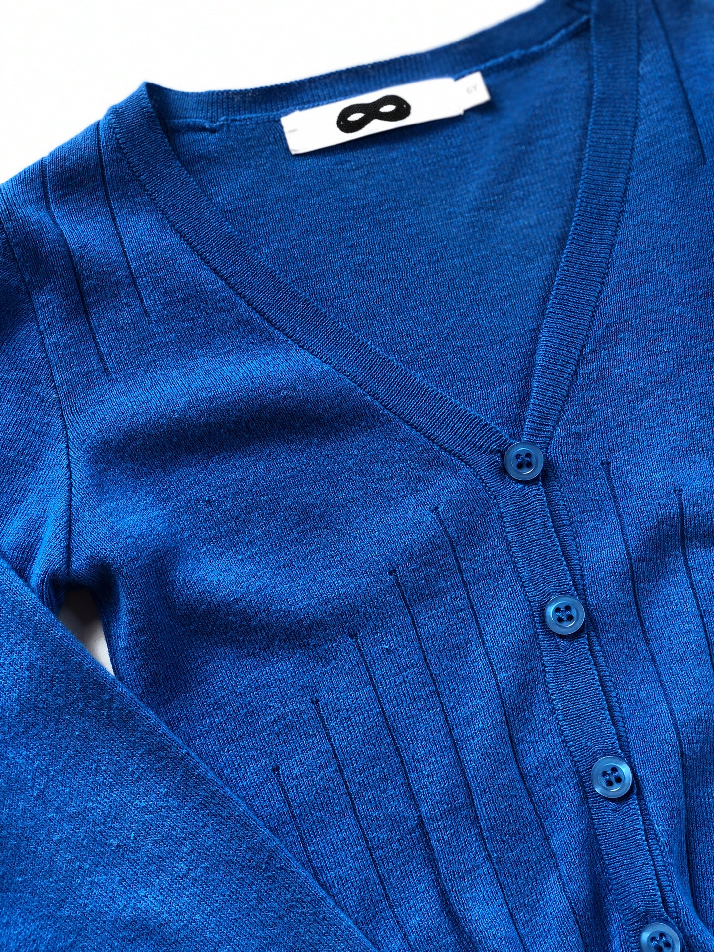 Gilet en mailles fines bleu 6 ans