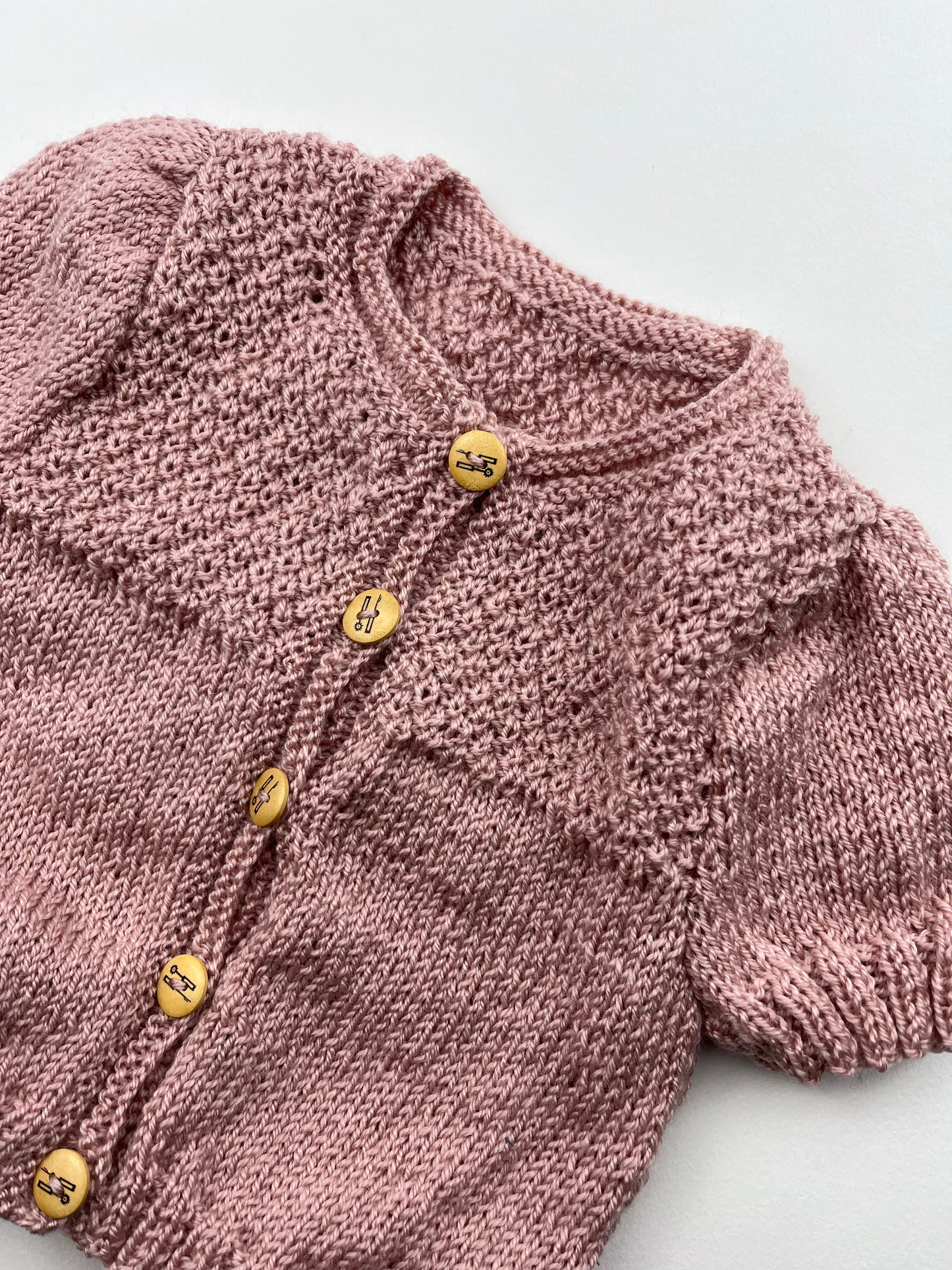 Gilet à manches courtes en mailles rose