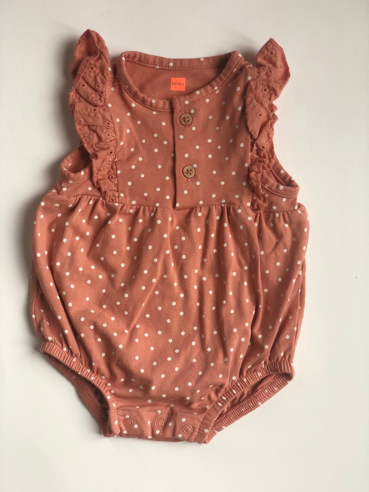 Barboteuse rose à pois blanc Hema 3 mois
