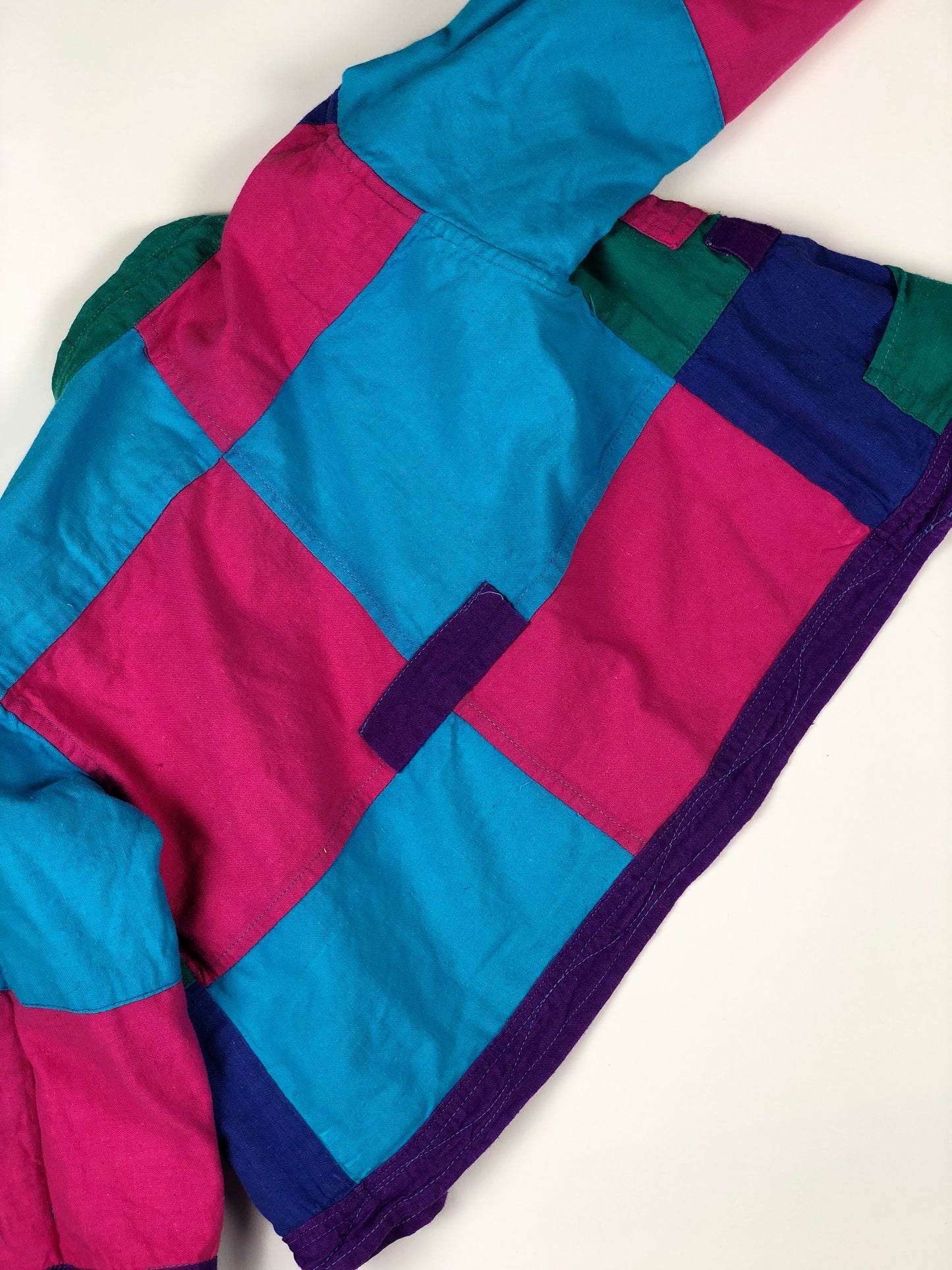 Veste patchwork multicolore réversible 2 ans