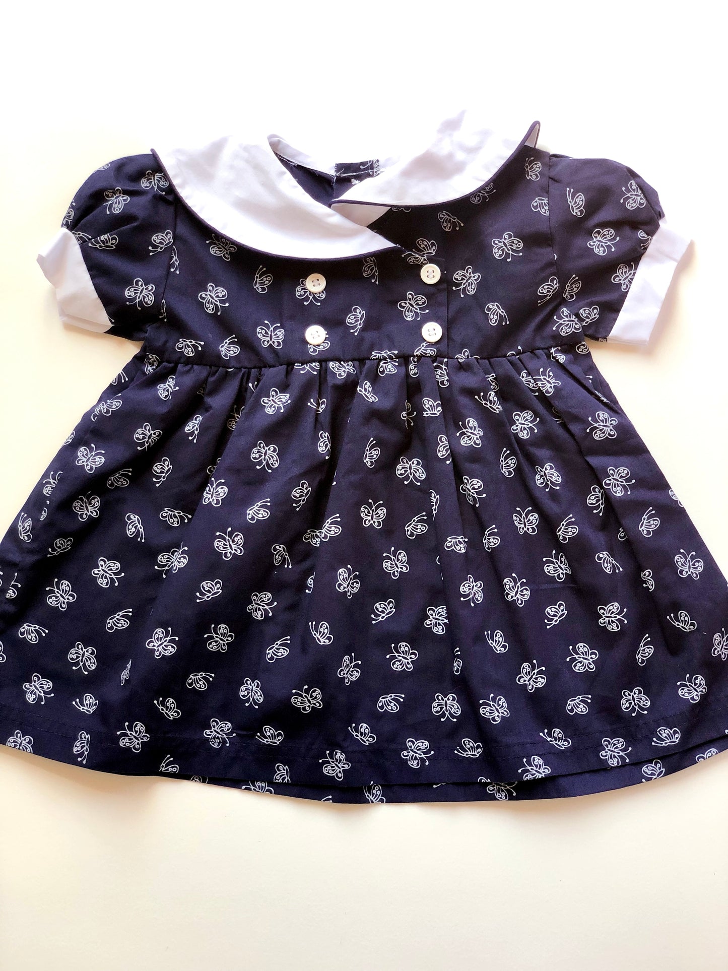Robe vintage bleue motifs papillons 12 mois
