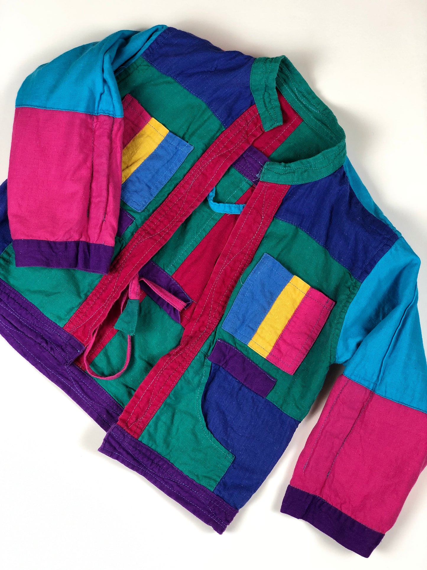 Veste patchwork multicolore réversible 2 ans