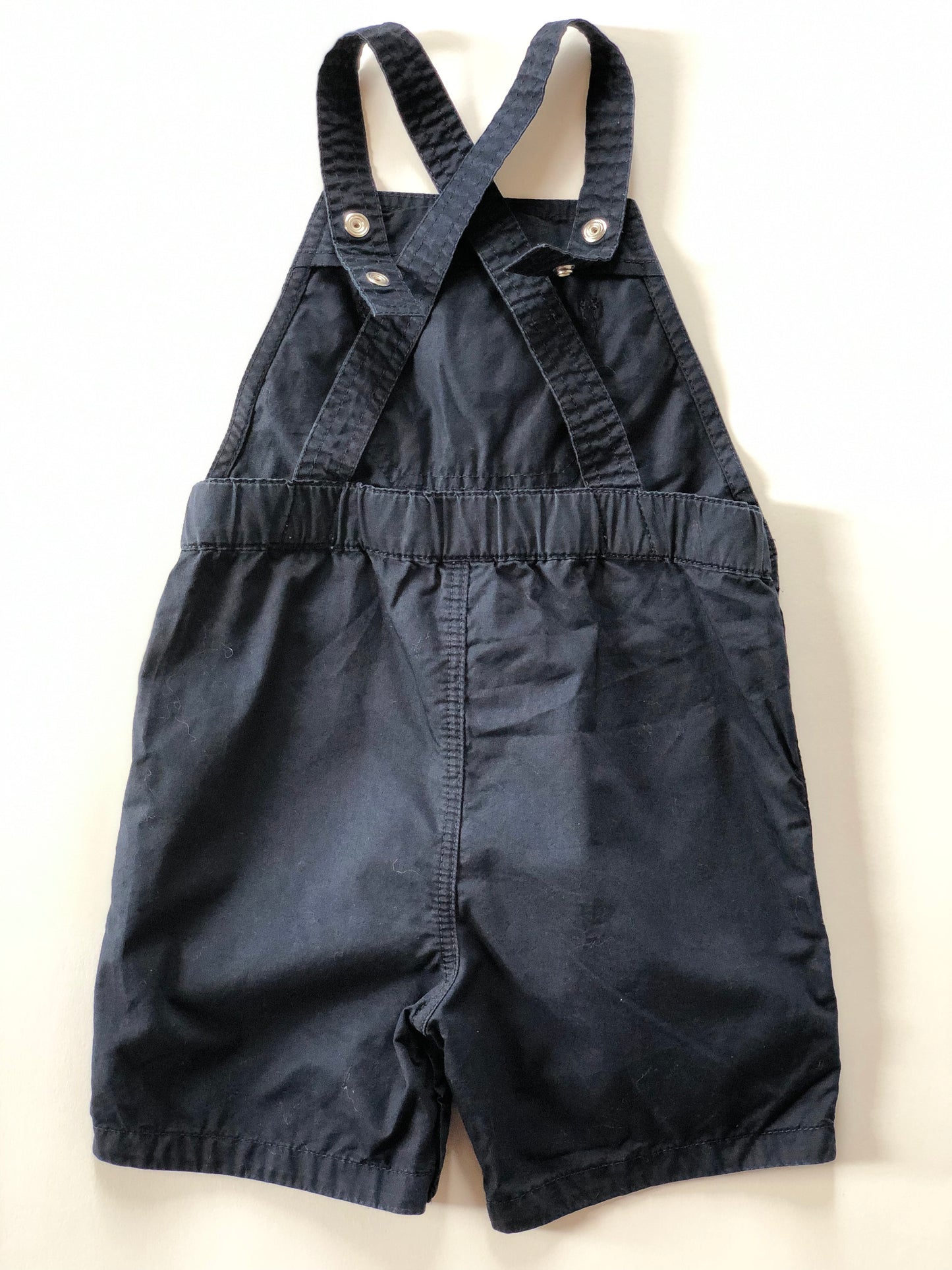 Salopette courte bleue marine Petit Bateau 2 ans