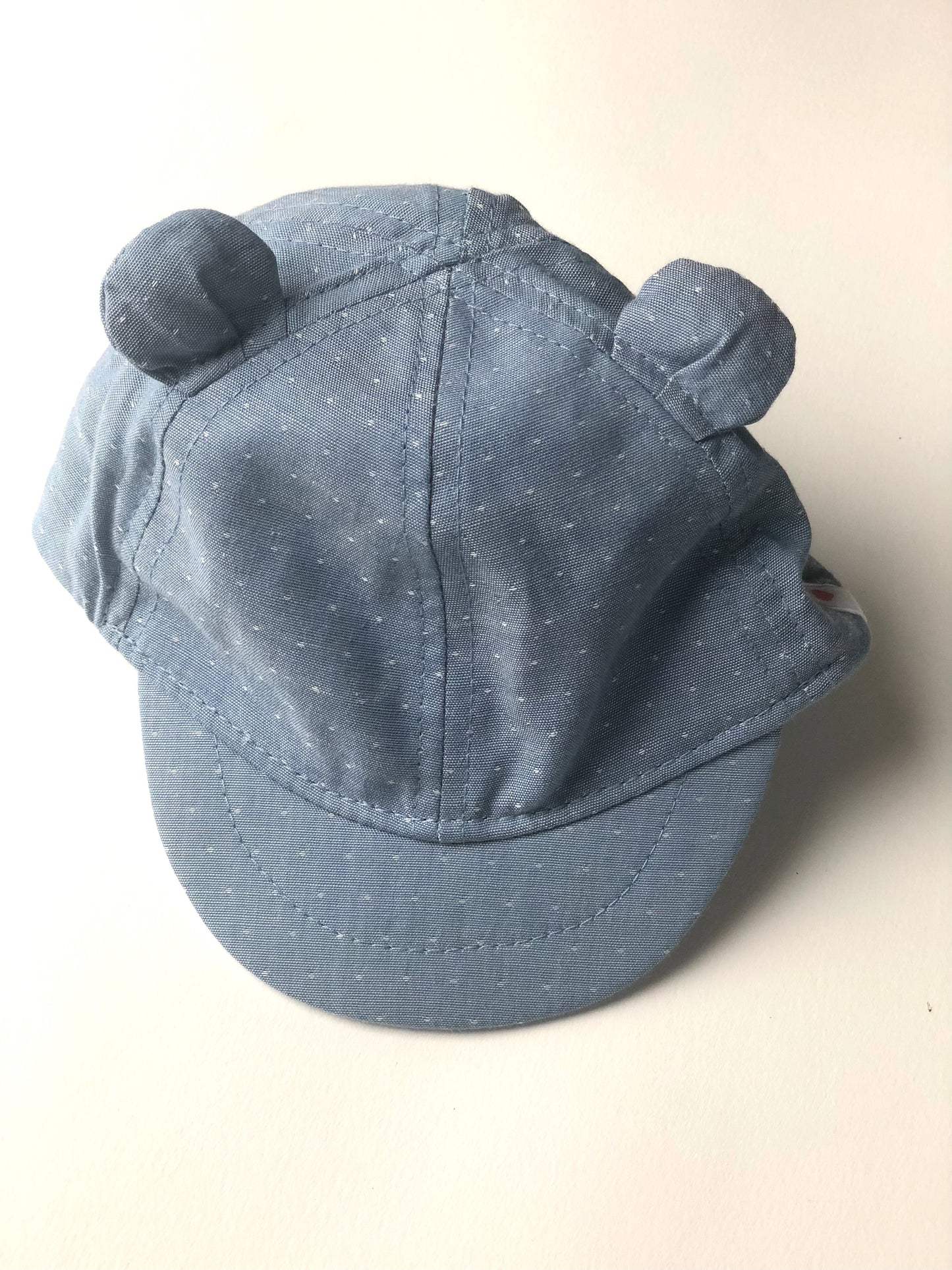 Casquette avec oreilles bleu à pois blanc Kiabi 43 cm