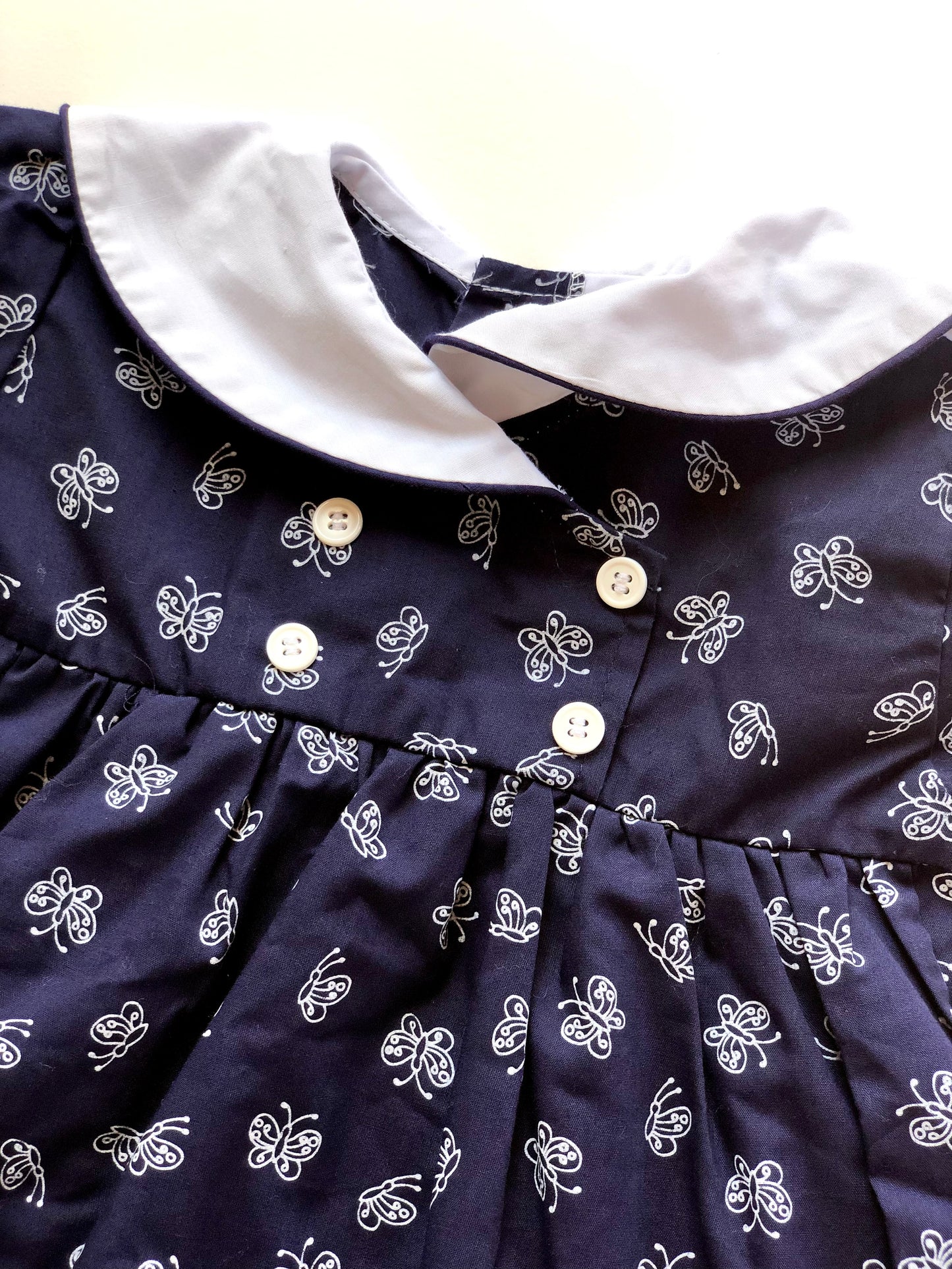 Robe vintage bleue motifs papillons 12 mois