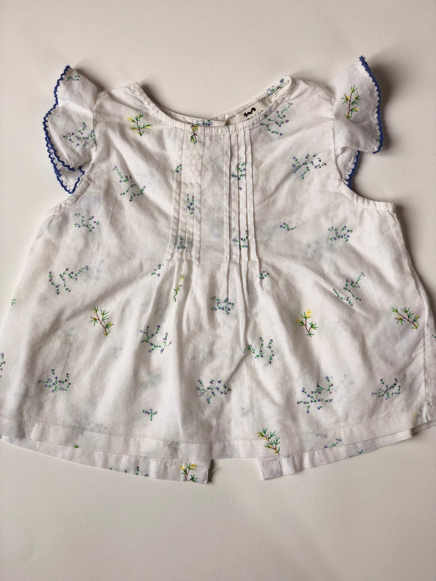 Blouse à fleurs blanc et violet Cyrillus 3 ans