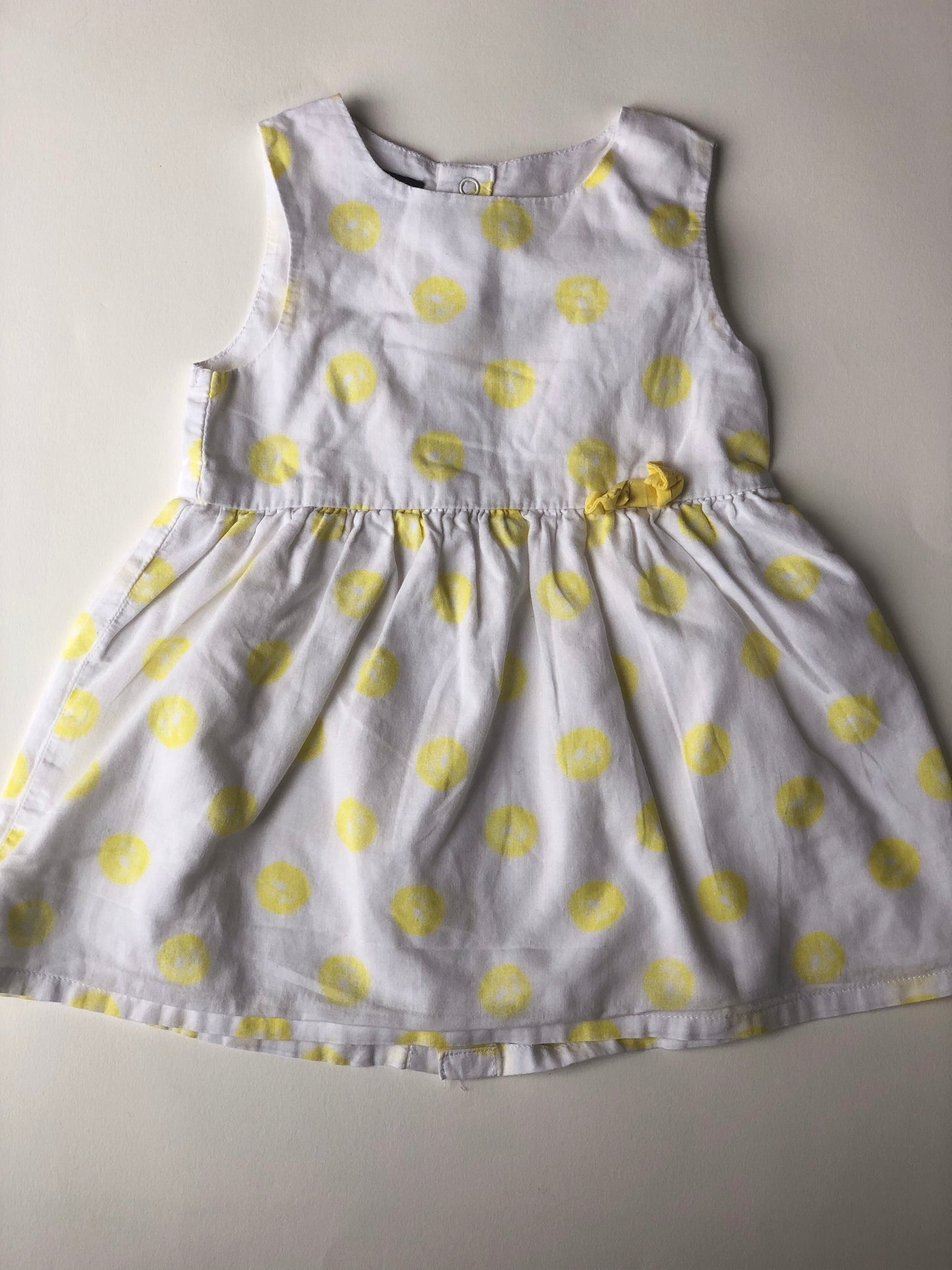 Robe à pois blanc et jaune Kiabi 6 mois