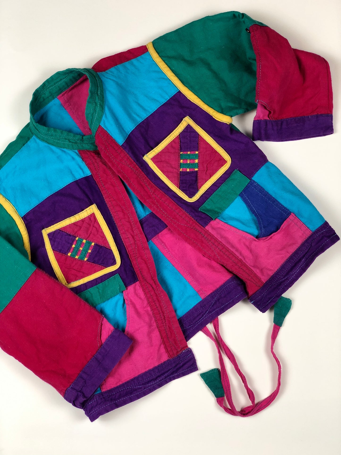 Veste patchwork multicolore réversible 2 ans