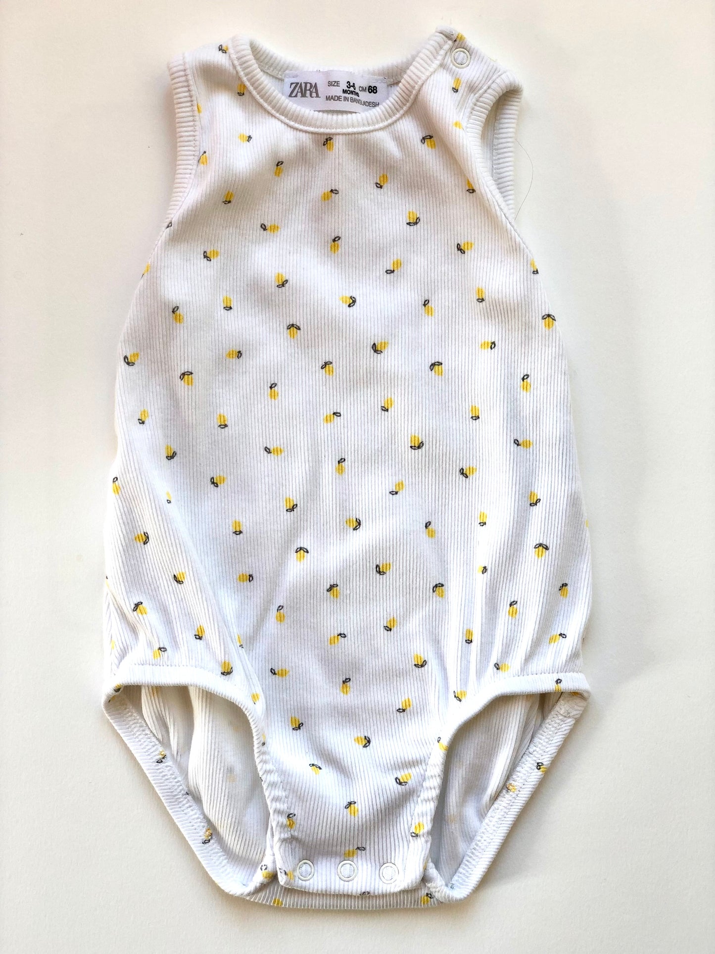 Bodie sans manche blanc et jaune motif citrons Zara 6 mois