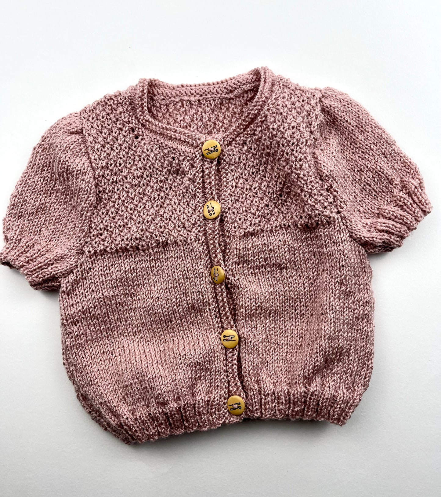 Gilet à manches courtes en mailles rose